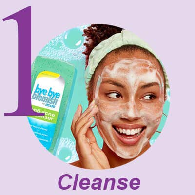Step 1 Cleanse - Woman applying acne cleanser